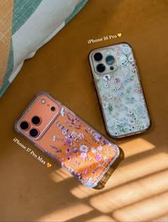 Two floral cases on an iPhone 16 Pro and iPhone 17 Pro Max in sunlight